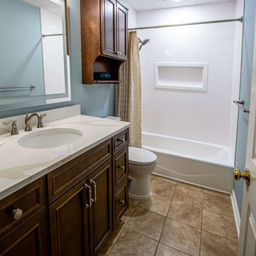 Guest Bathroom Transformation with Stylish Wood Vanity and Custom Shower