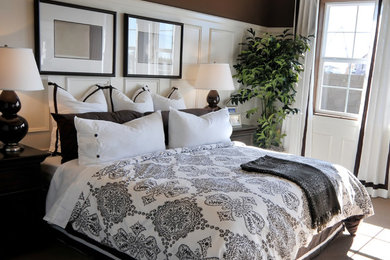 Inspiration for a mid-sized timeless carpeted and brown floor bedroom remodel in San Francisco with red walls