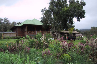 Example of an island style exterior home design in Hawaii