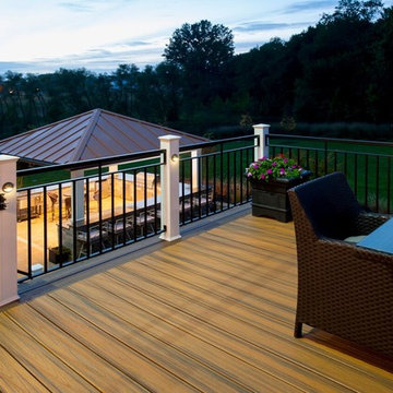 Design Builders Trex deck and outdoor kitchen with copper roof pavilion in Fulto