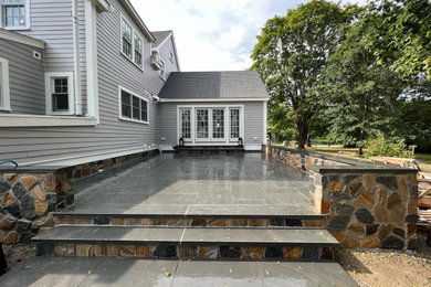 Bluestone Patio and Natural thin veneer stone wallls