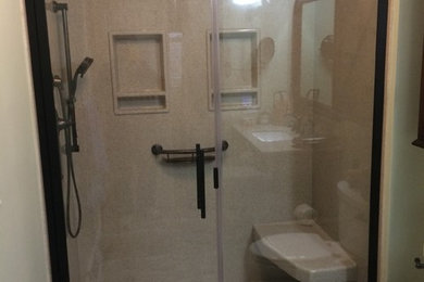 Example of a mid-sized trendy master linoleum floor alcove shower design in Other with raised-panel cabinets, dark wood cabinets, a two-piece toilet, blue walls, an integrated sink and quartz countertops