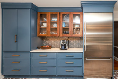 Small elegant l-shaped brick floor and multicolored floor eat-in kitchen photo in Atlanta with an undermount sink, flat-panel cabinets, blue cabinets, quartz countertops, blue backsplash, an island and white countertops