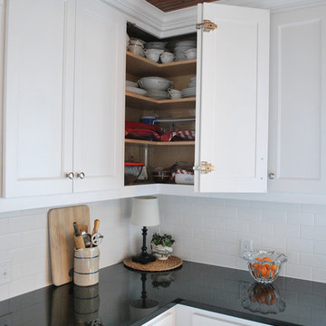 Corner shelves with bi-fold door