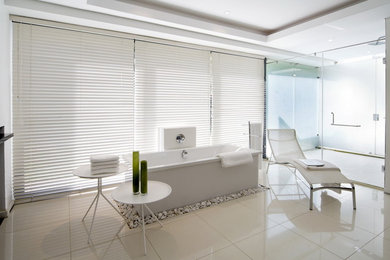 Inspiration for a contemporary freestanding bathtub remodel