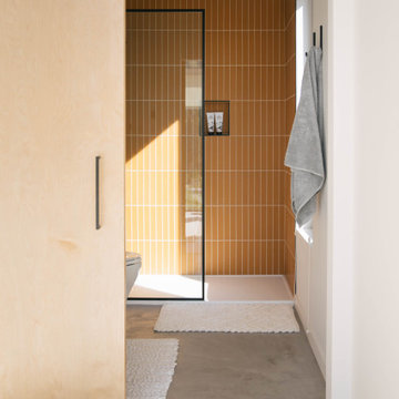 Sunny Bathroom with Yellow Glass Tile Shower