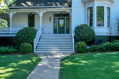 Large transitional white two-story wood exterior home photo in Atlanta with a shingle roof