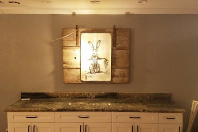 Eat-in kitchen - large eclectic u-shaped eat-in kitchen idea in Tampa with an undermount sink, shaker cabinets, white cabinets, granite countertops, stone slab backsplash, stainless steel appliances and an island