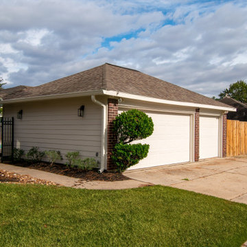 Re-side and gutters of mid-90's 2 story house in Houston, TX