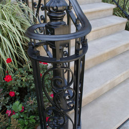Solid stone stairs with ornamental iron railing - Products