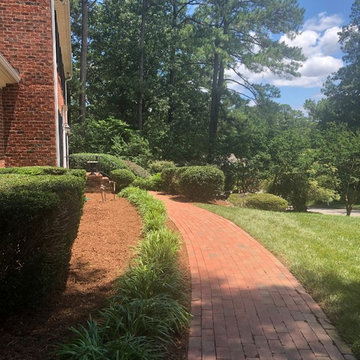 Mulching,pruning,sod, river rock, stepping stone installs