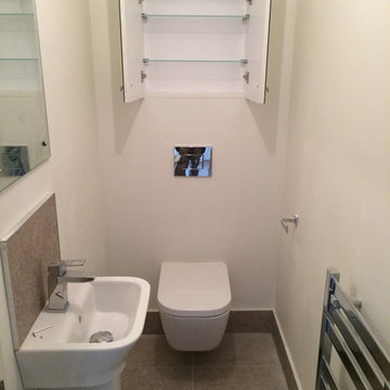 Downstairs Loo With Wall Hung WC & Concealed Storage