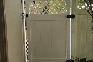 White Fence Door Installation