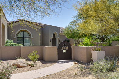 Tuscan exterior home photo in Phoenix