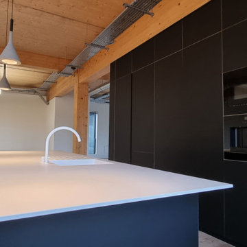 Fenix NTM contemporary kitchen with island.