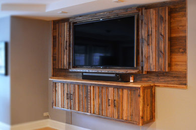 Inspiration for a large rustic enclosed living room remodel in Chicago with a wall-mounted tv