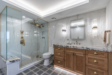 Example of a beach style master bathroom design in Miami