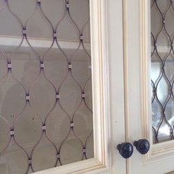 Klise custom Moorish style wire grilles (style #503) created for Botello Lumber. - Home Decor