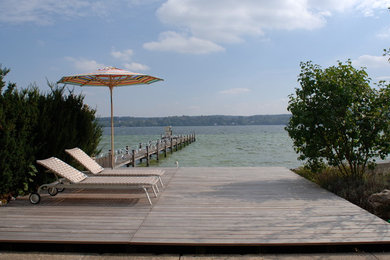 Photo of a large contemporary deck in Munich with no cover.
