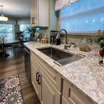 Two Tone Kitchen with Irish Creme Cabinets and Rustic Dockside Island