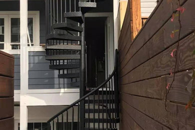 Apartment exterior wrought iron spiral staircase
