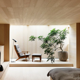 Immagine di una piccola camera da letto etnica