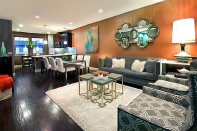Living room - small transitional loft-style dark wood floor living room idea in San Francisco with gray walls, no fireplace and a wall-mounted tv