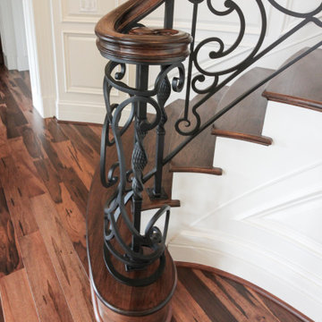 Project #74 | Circular Staircase with Hand-Forged Metal Panels