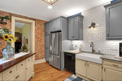 Example of a cottage kitchen design in Other