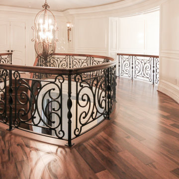 Project #74 | Circular Staircase with Hand-Forged Metal Panels