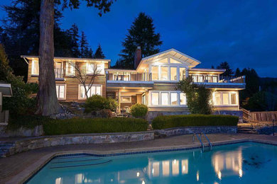 Cottage home design photo in Vancouver