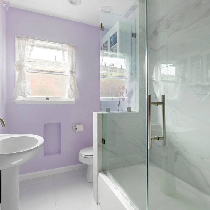 Bathroom - mid-sized contemporary 3/4 gray tile and ceramic tile ceramic tile, white floor and single-sink bathroom idea in Los Angeles with white cabinets, a one-piece toilet, purple walls, a pedesta