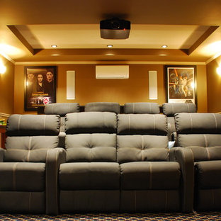 Mid-sized trendy enclosed carpeted home theater photo in Bridgeport with a wall-mounted tv and brown walls