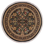 Bareens Designer Rugs - Nagi Pak Persian Camellia Black/Gray Wool Round - 9'0'' x 9'2'' - Designed with mesmerizing intricacy and gorgeous color palette, this hand-knotted masterpiece demonstrates the beauty and electrifying thrill of Pak Persian art. These meticulously hand-knotted Pak-Persian rug is made with pure wool and features breathtaking traditional, transitional, and tribal designs in bold luxurious color pallets. Known for their intricate designs these rugs are a reproduction of Persian rugs, made in Pakistan with unique Mughal designs. Made by master weavers using the same Persian texture, design and dying technique, we wanted to produce the most significant manifestation of Persian art, life, and culture. This rug is most famous for its exceptional quality, incredible designs, patterns, and vibrant rich color. Pak-Persian rugs made with Persian weave with high knot counts, which enables the high intricacy and detail found in the patterns are also referred to as "State of art", each color adds a rich beautiful detail in the artwork of this rug. The design, color, and beautiful chromatic composition with a vibrant sheen with intricate designs, exude beauty, elegance, and quality make this rug a masterpiece of its own.