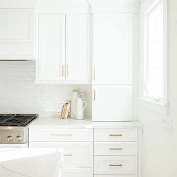 All White Transitional Kitchen with Herringbone Wood Floor