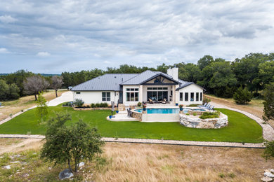 Transitional exterior home photo in Austin