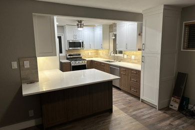 Example of an arts and crafts kitchen design in Denver
