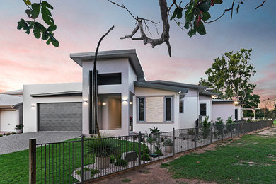 Photo of a contemporary home design in Townsville.