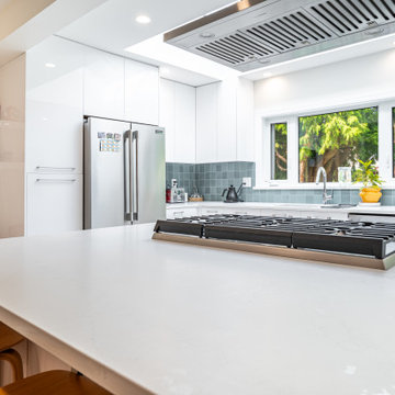 Quartz Waterfall Kitchen Island with Gas Cooktop – Kerrisdale Vancouver Renovati