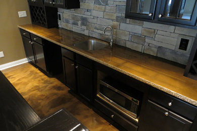 Elegant concrete floor basement photo in Cincinnati