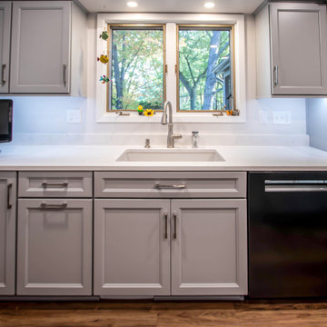 Custom Two Tone Gray Kosher Kitchen with Quartz Countertops