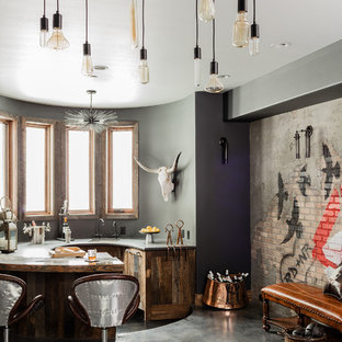 Inspiration for an eclectic u-shaped wet bar in Salt Lake City with an undermount sink, medium wood cabinets, concrete floors and grey floor.