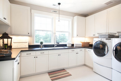 Inspiration for a transitional laundry room remodel in Portland
