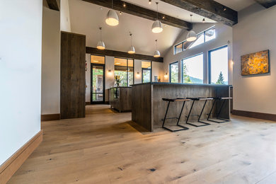 Example of a trendy kitchen design in Denver with two islands