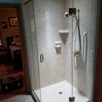 Neo angle corner shower in polished brass (gold) w/glass to glass hinges and hea