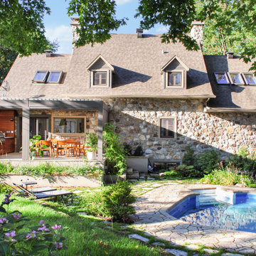 Outdoor kitchen with louvered pergola