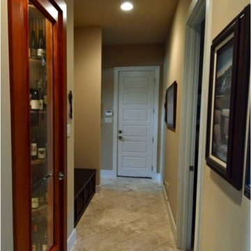 Elegant Wood and Glass Wine Cellar Door Designed by San Antonio Builderds