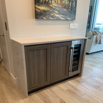 Custom Shaker Dry Bar Cabinet with Wine Fridge & Quartz Waterfall Countertop