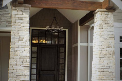 Example of an arts and crafts entryway design in Seattle