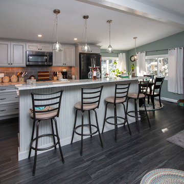 Transitional Steaked Limestone Kitchen Remodel w/ white Bahamas Granite top